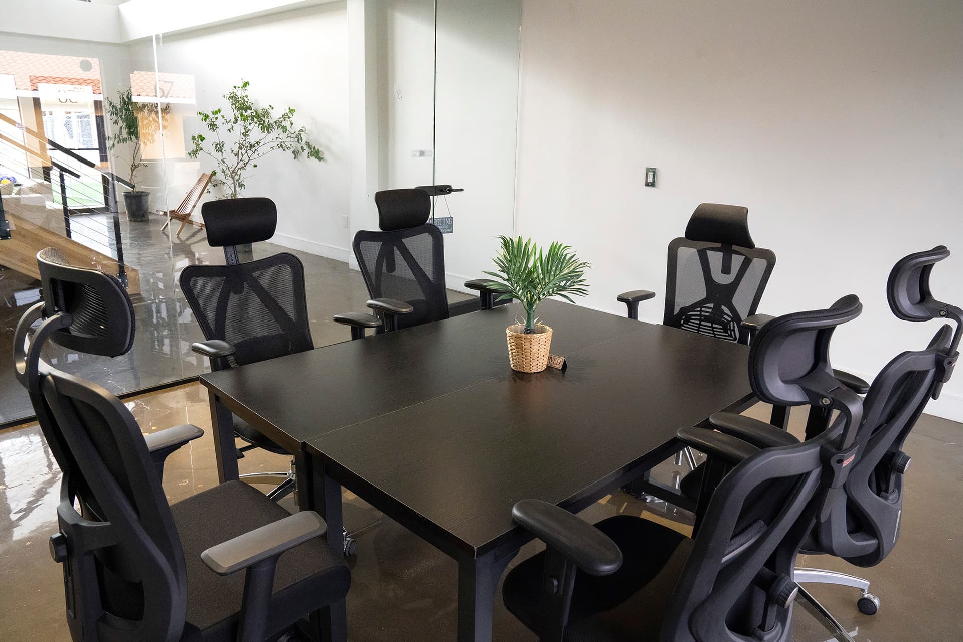 Conference Room II, beside the staircase